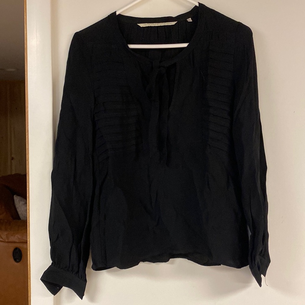 Women’s blouse with triangle bust cutout and tie